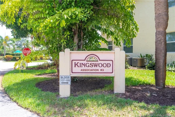 a view of swimming pool with a table and chairs