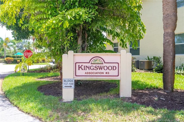 a view of swimming pool with a table and chairs