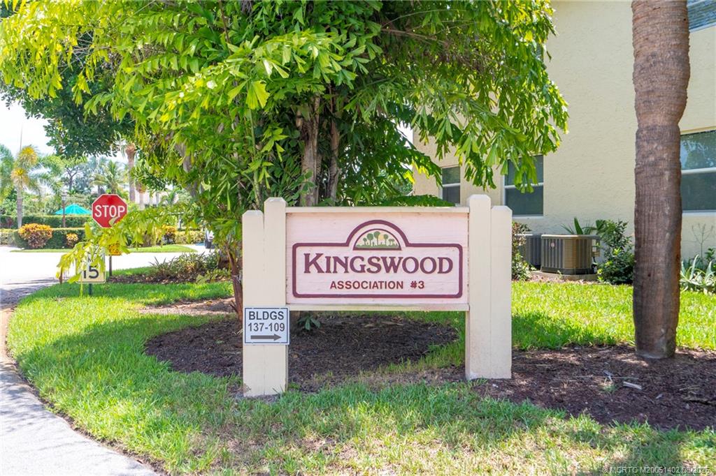 2950 Southeast Ocean Boulevard, Unit 1211 Stuart, FL 34996 - Photo 29 of 61 a sign on the side of the building