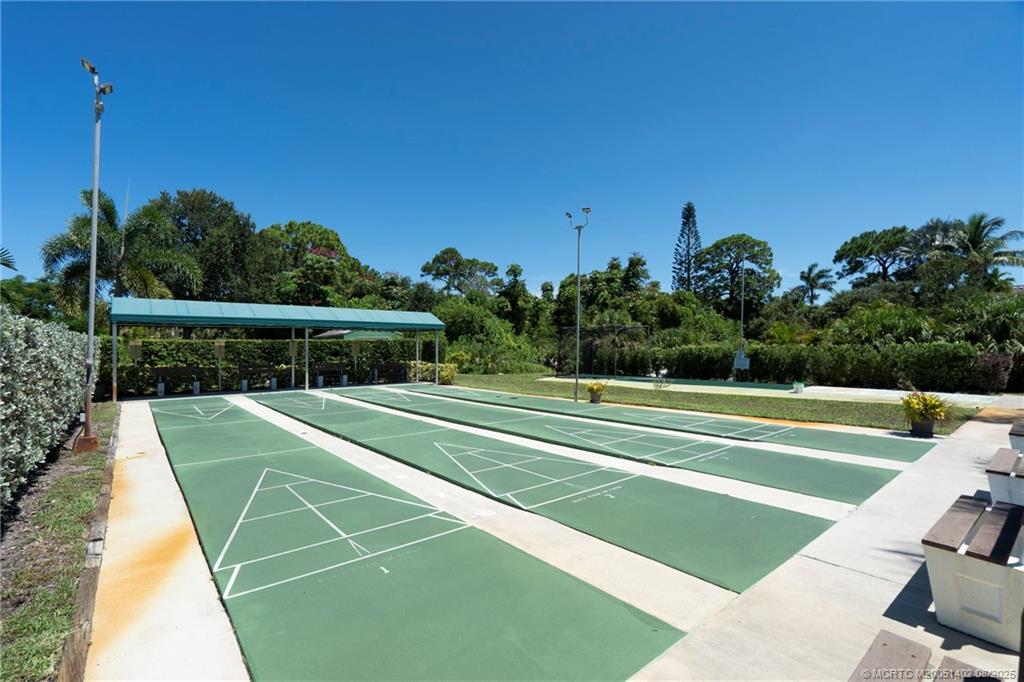 2950 Southeast Ocean Boulevard, Unit 1211 Stuart, FL 34996 - Photo 46 of 61 a view of a tennis court
