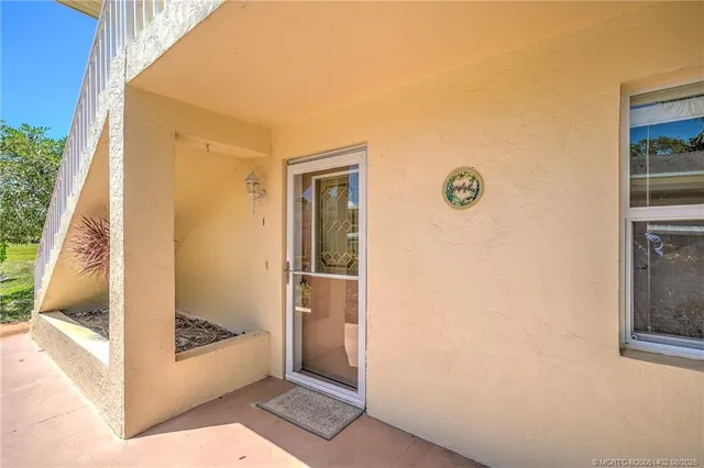 a bathroom with a shower and a toilet
