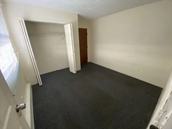 an empty room with a door