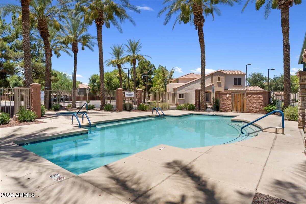 2600 East Springfield Place, Unit 87 Chandler, AZ 85286 - Photo 32 of 40 32-Communit pool steps from unit