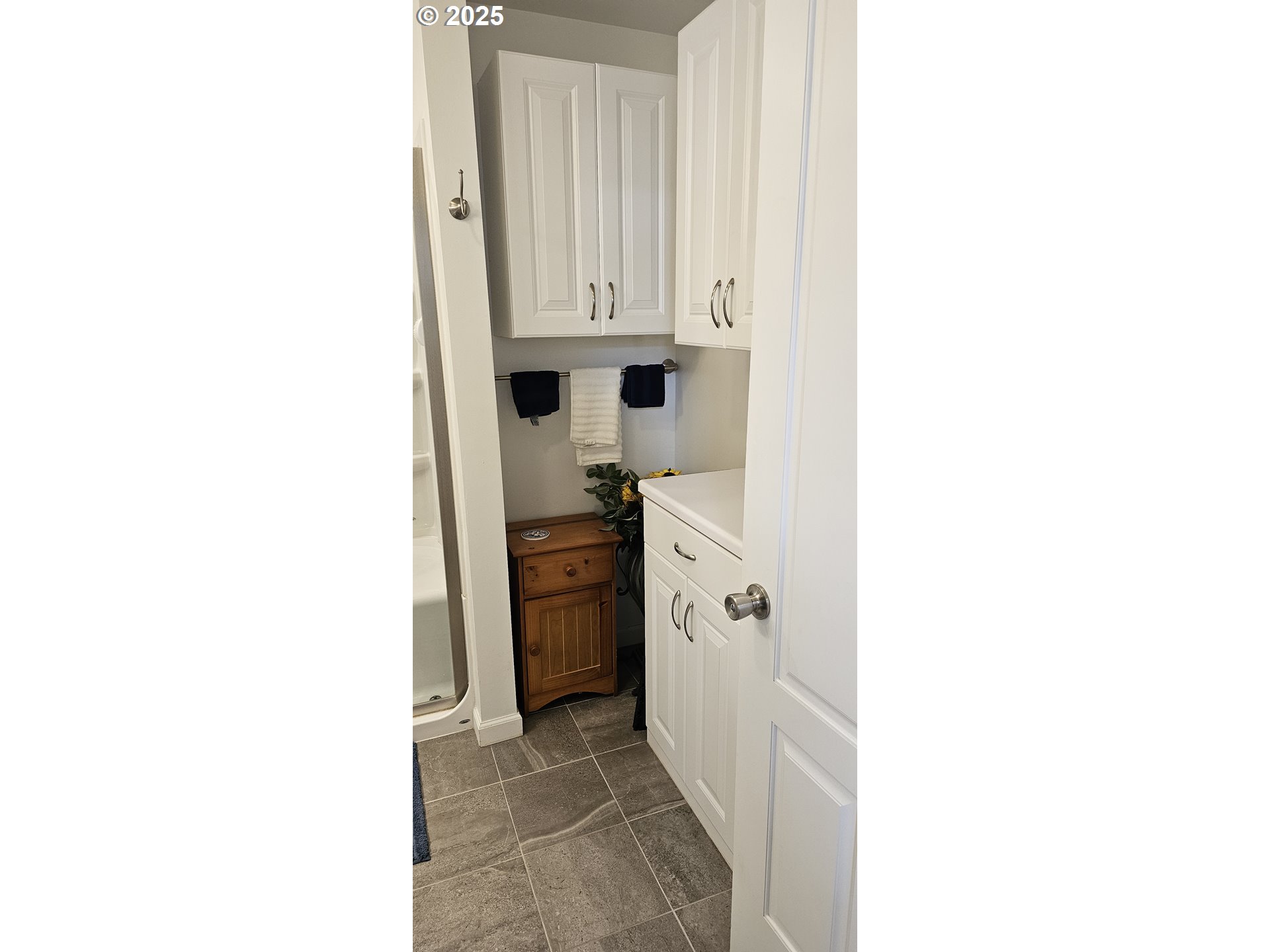 524 Azalea Drive Elkton, OR 97436 - Photo 23 of 48 a kitchen with white cabinets