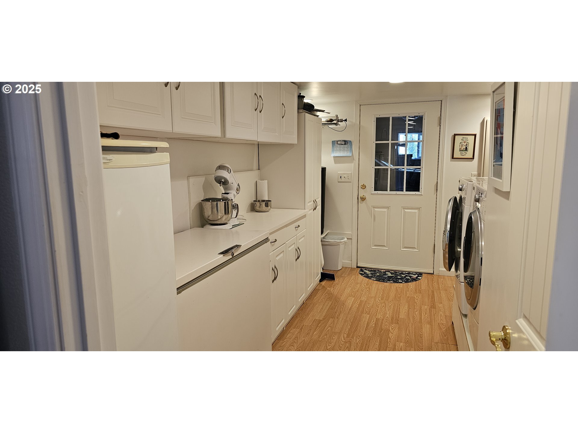 524 Azalea Drive Elkton, OR 97436 - Photo 31 of 48 a kitchen with refrigerator and cabinets
