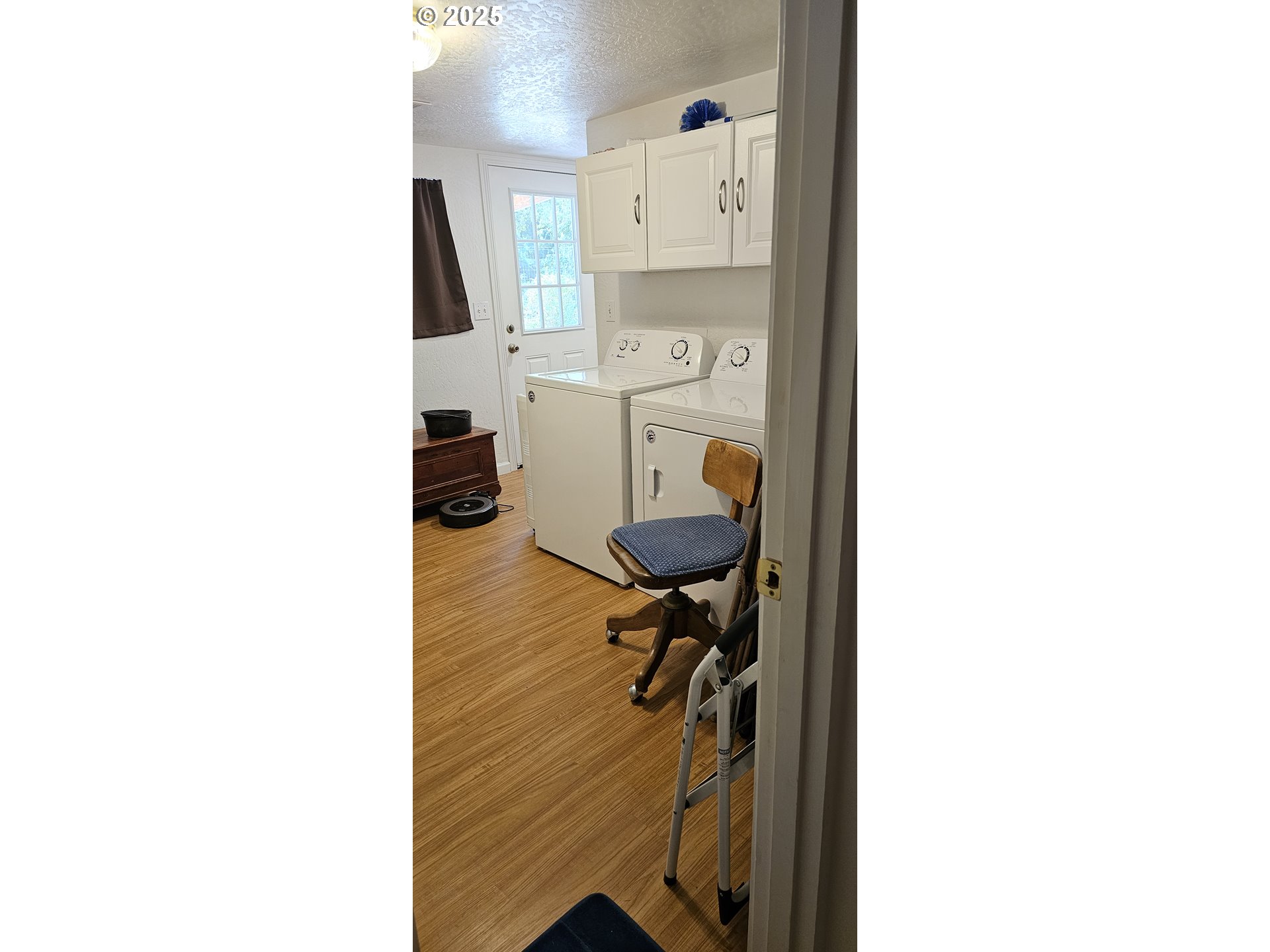 524 Azalea Drive Elkton, OR 97436 - Photo 39 of 48 a view of storage and utility room with racks on the wall