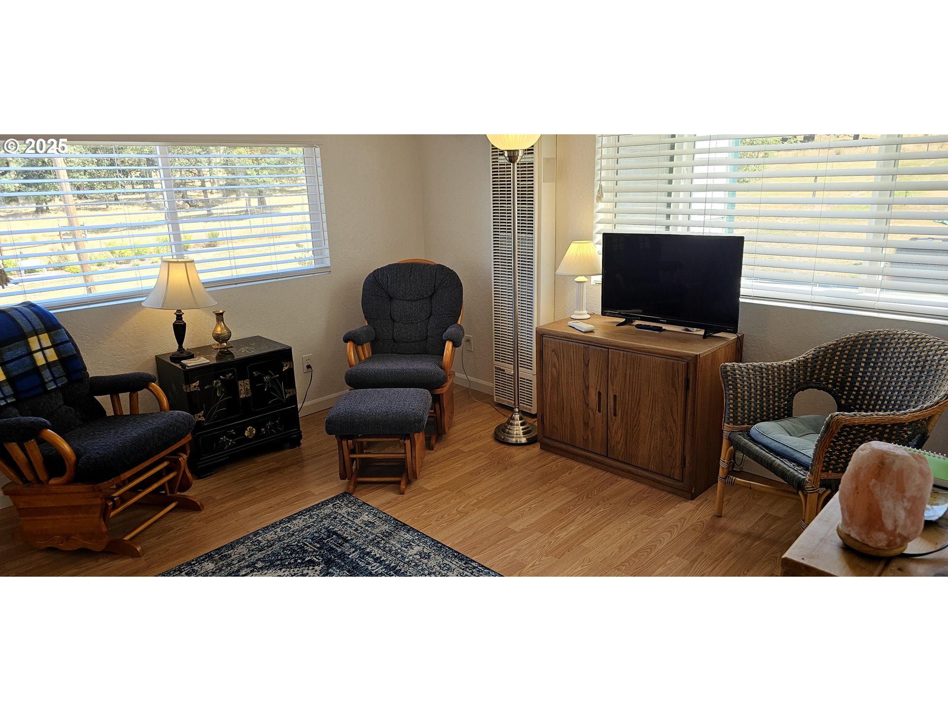 524 Azalea Drive Elkton, OR 97436 - Photo 41 of 48 a living room with furniture and a flat screen tv