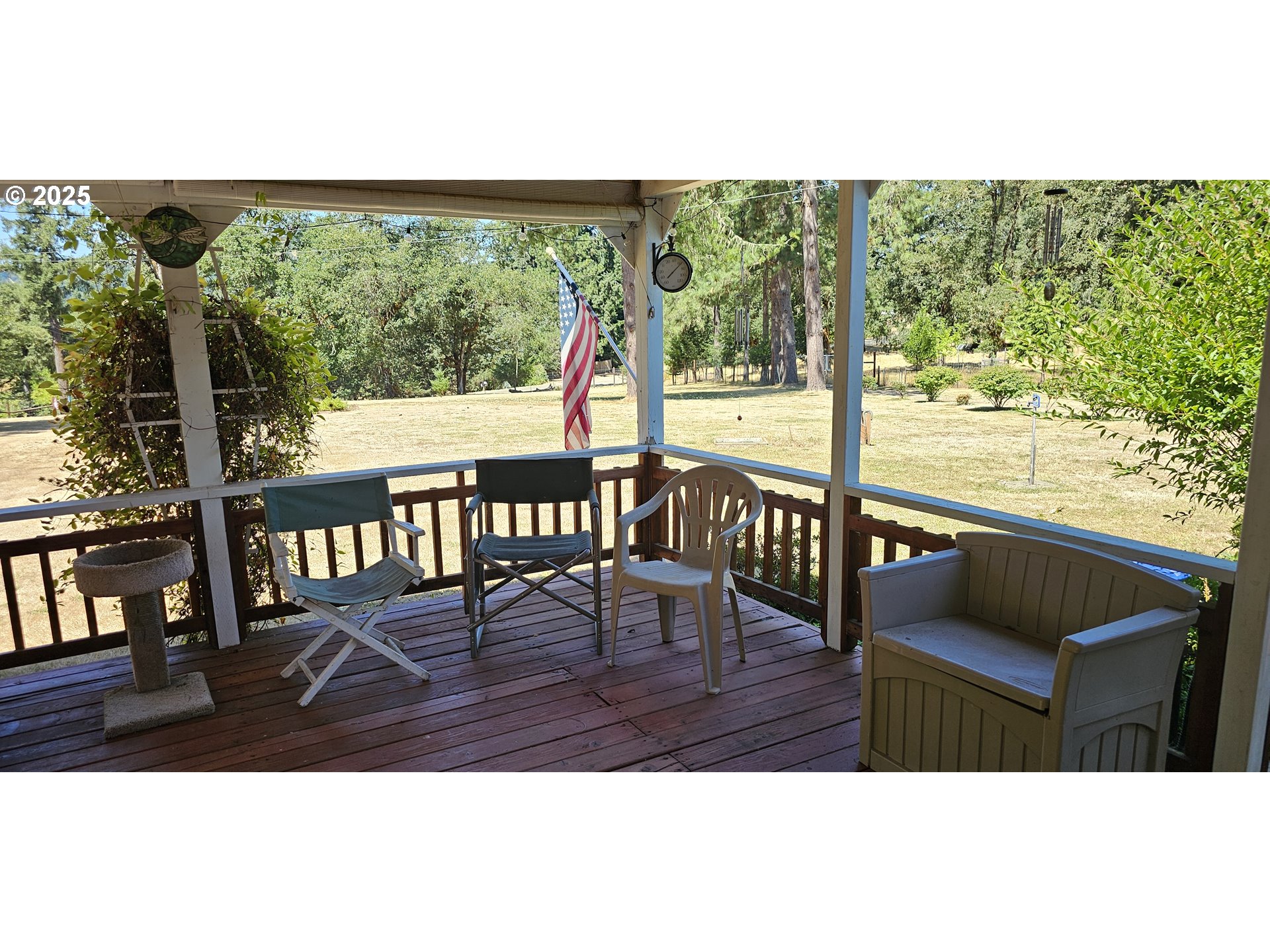 524 Azalea Drive Elkton, OR 97436 - Photo 10 of 48 a view of a city from a balcony with furniture