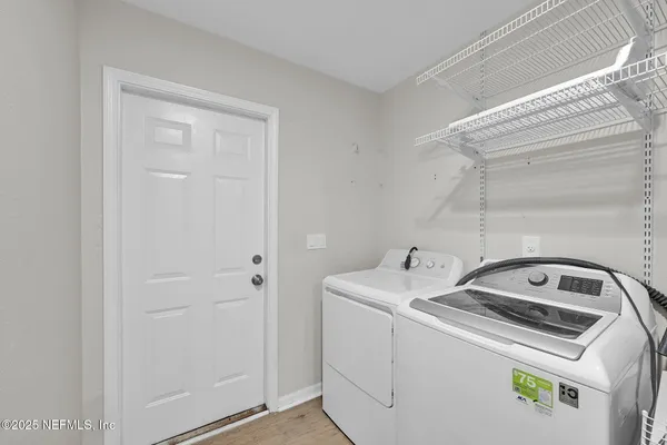 a utility room with dryer and washer
