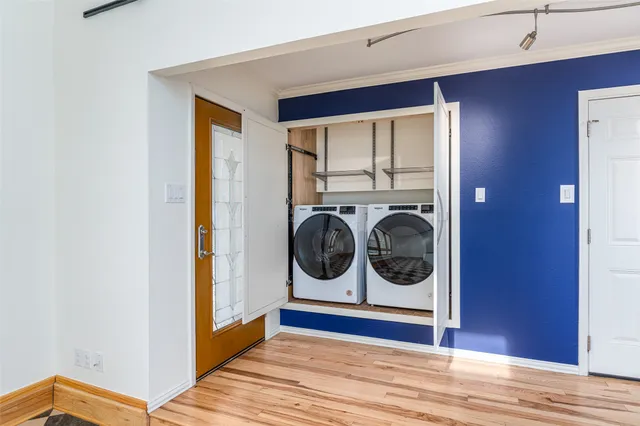 a view of a patio with a table and chairs