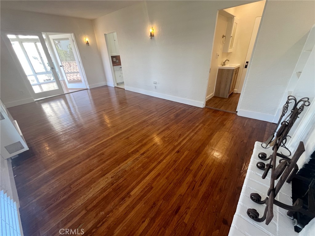 33910 Orilla Road, Unit 7 Dana Point, CA 92629 - Photo 3 of 50 a view of a room with wooden floor and windows