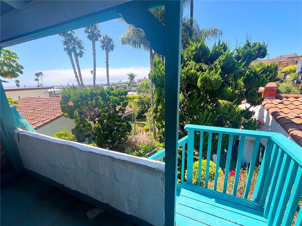 33910 Orilla Road, Unit 7 Dana Point, CA 92629 - Photo 43 of 50 a view of a balcony with wooden floor