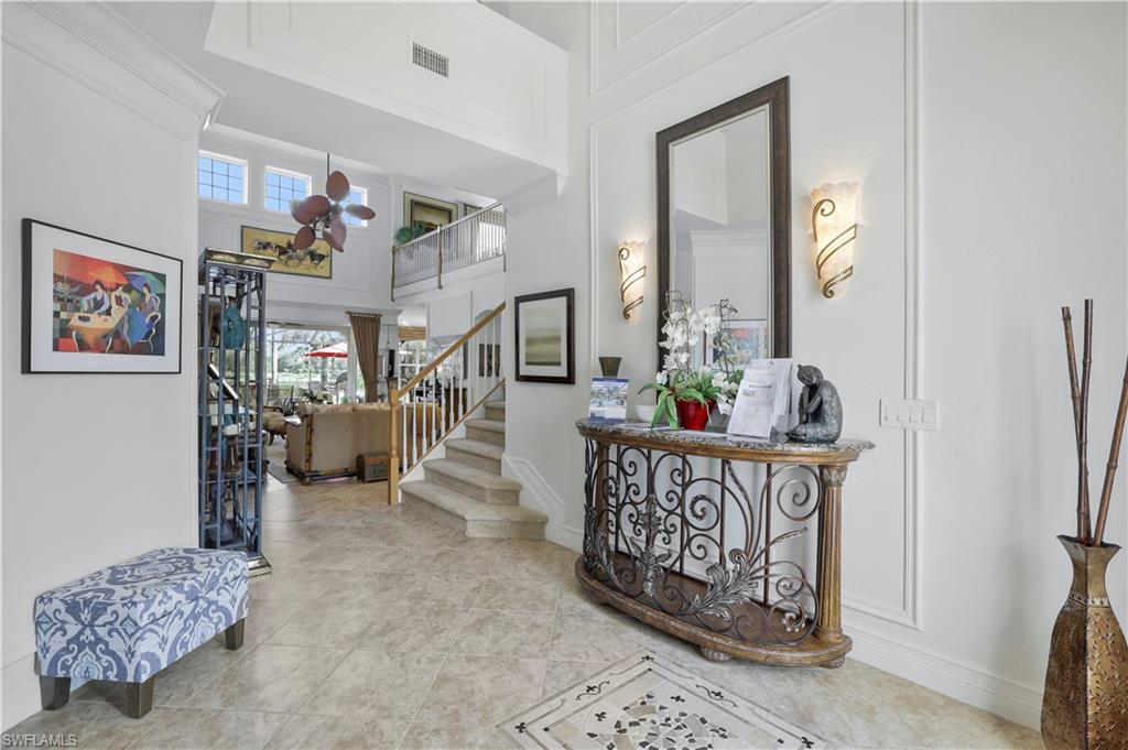 9104 Quartz Lane Naples, FL 34120 - Photo 12 of 47 a living room with furniture