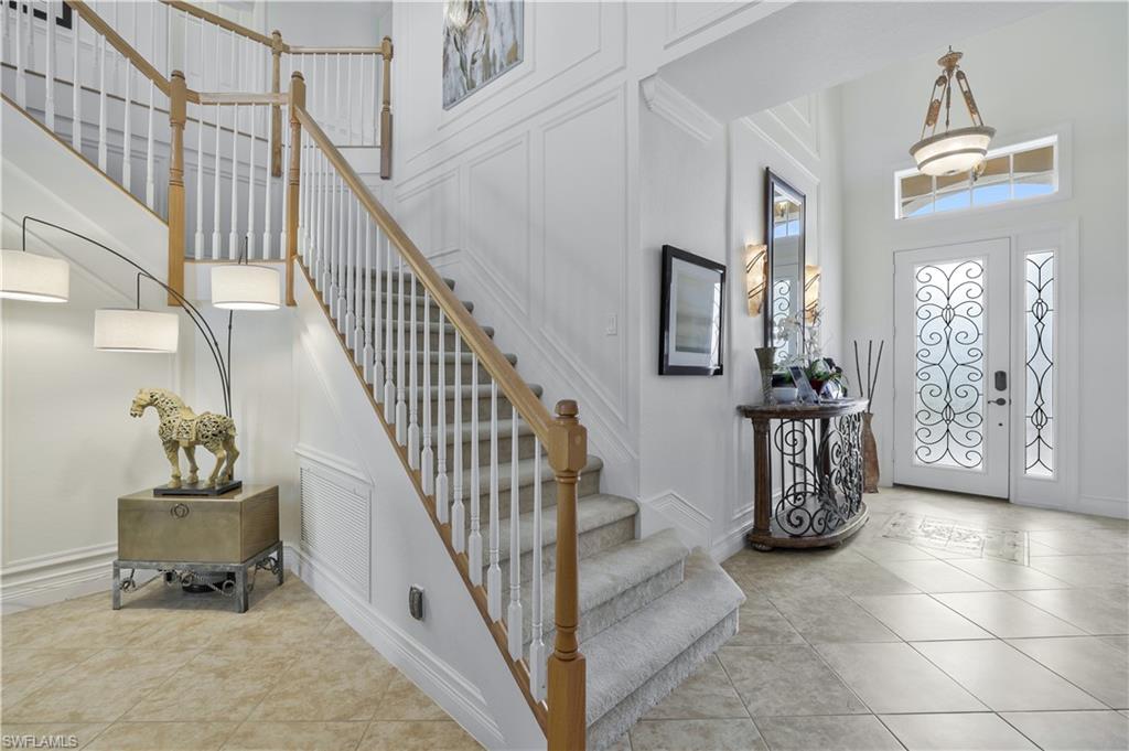 9104 Quartz Lane Naples, FL 34120 - Photo 13 of 47 a view of entryway and hall