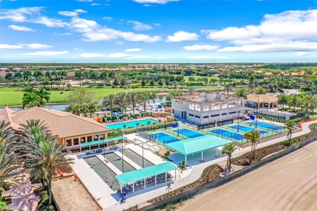 9104 Quartz Lane Naples, FL 34120 - Photo 40 of 47 an aerial view of a house with a garden