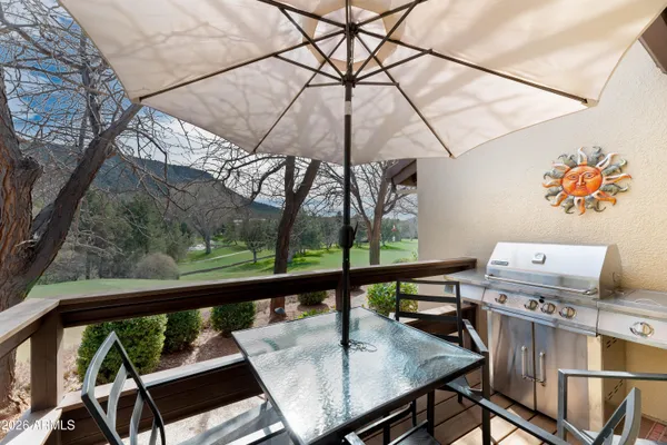 a view of a backyard with pathway