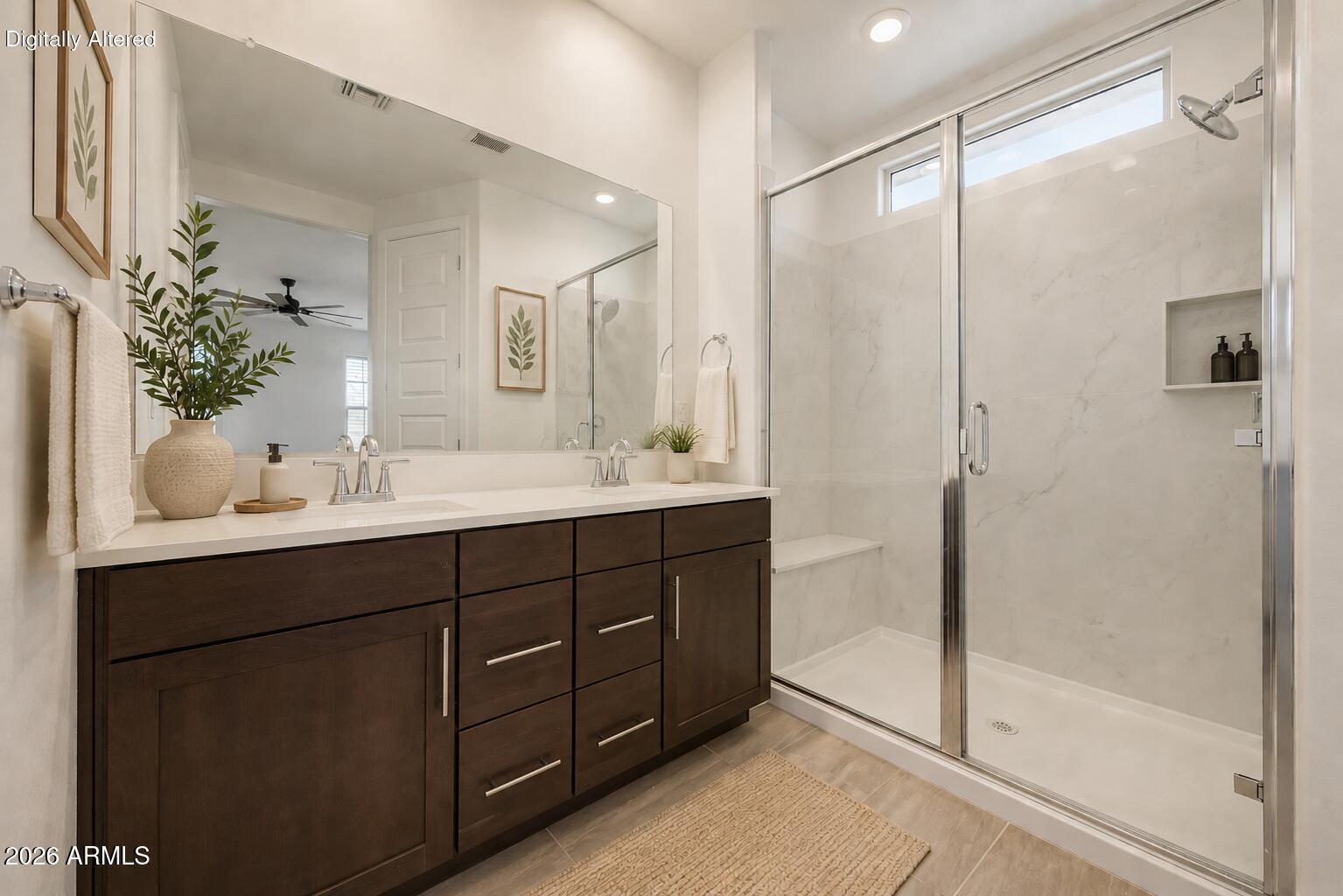 23080 East Stacey Road Queen Creek, AZ 85142 - Photo 19 of 42 a bathroom with a double vanity sink mirror and shower