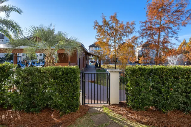 a bathroom with double sink and a mirror