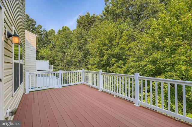 a view of a wooden roof deck