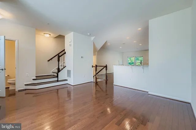 a view of entryway with wooden floor
