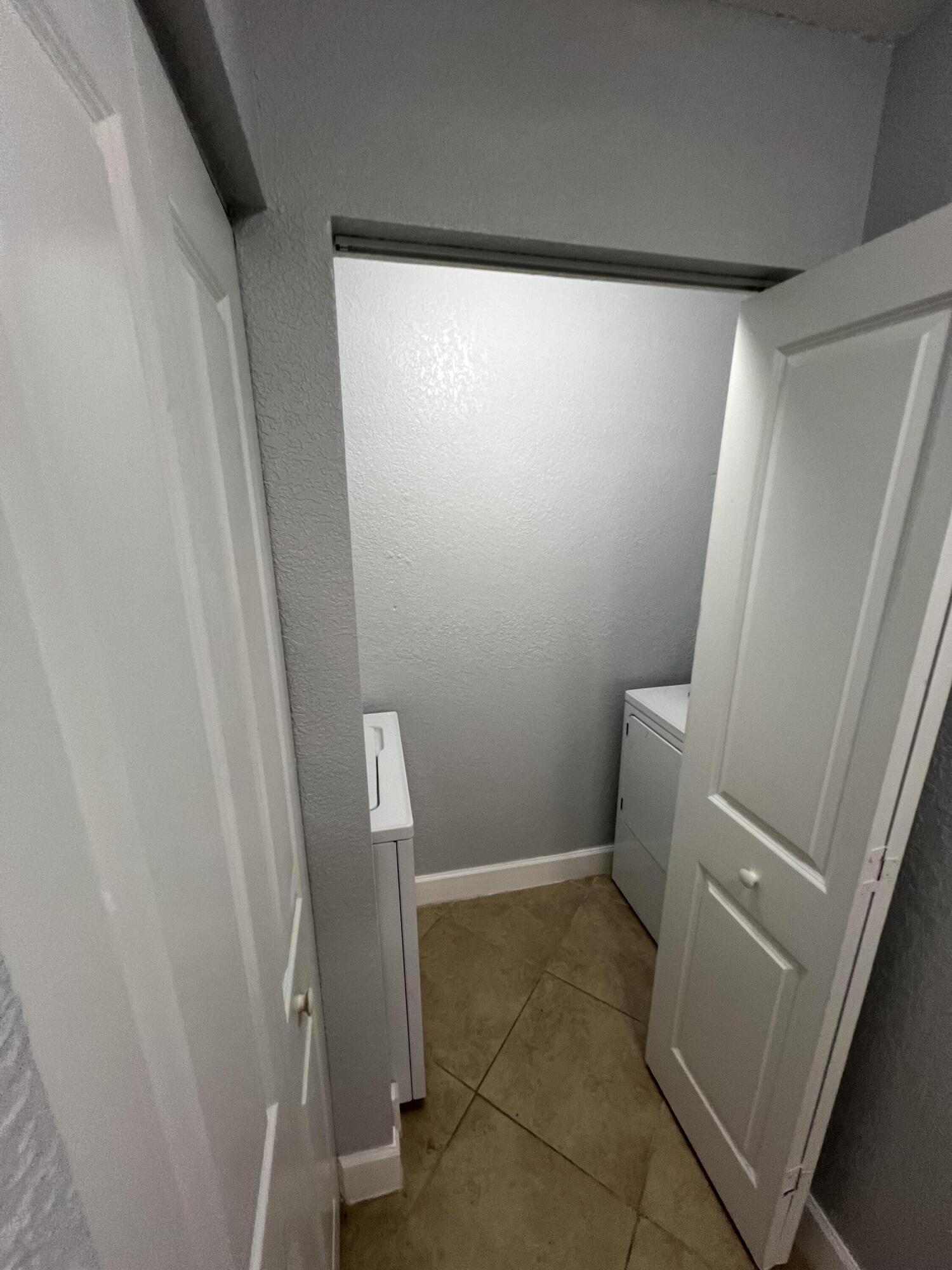 1660 Renaissance Commons Boulevard, Unit 2218 Boynton Beach, FL 33426 - Photo 20 of 23 a bathroom with a sink and toilet