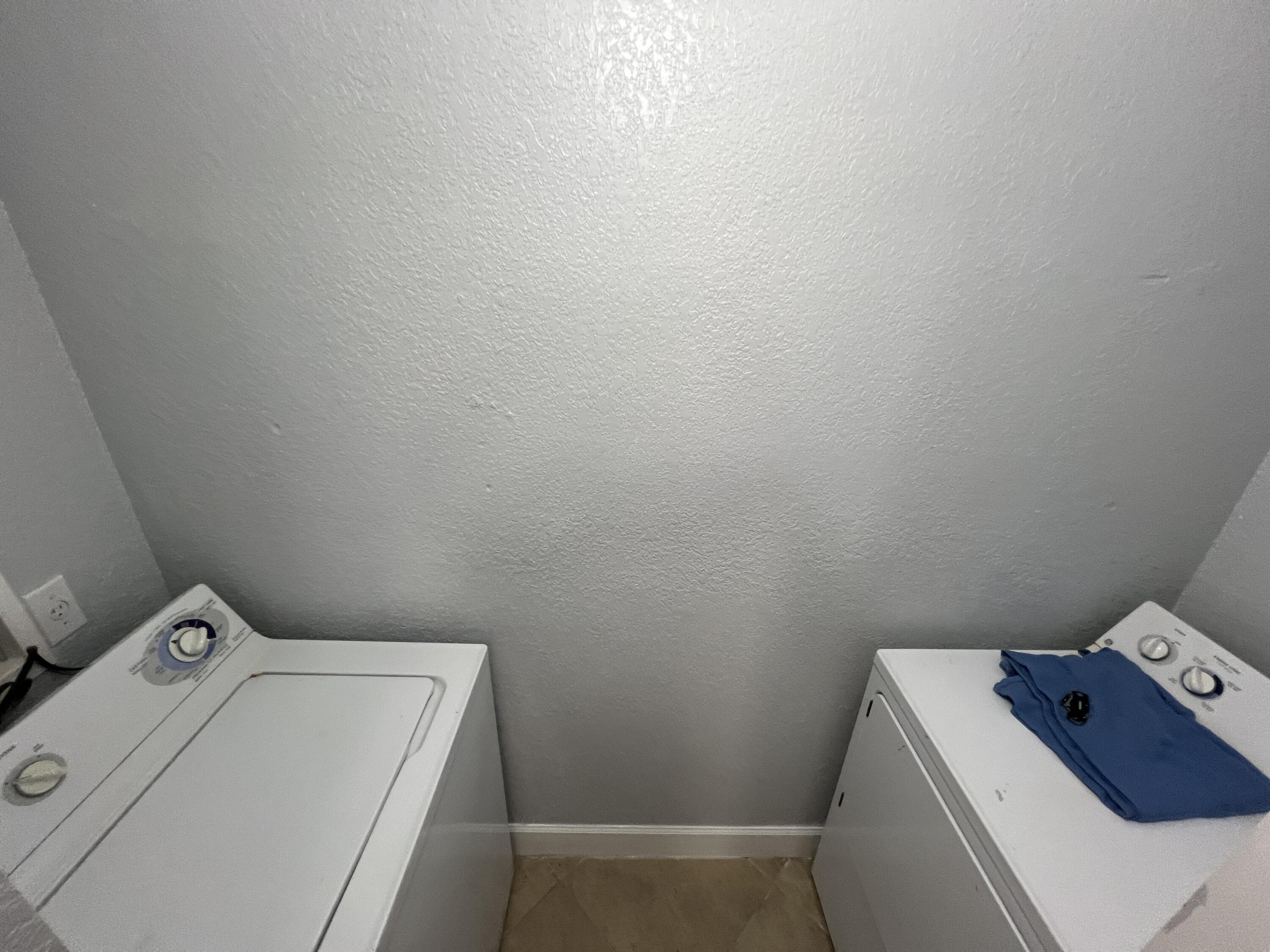 1660 Renaissance Commons Boulevard, Unit 2218 Boynton Beach, FL 33426 - Photo 21 of 23 a utility room with dryer and washer