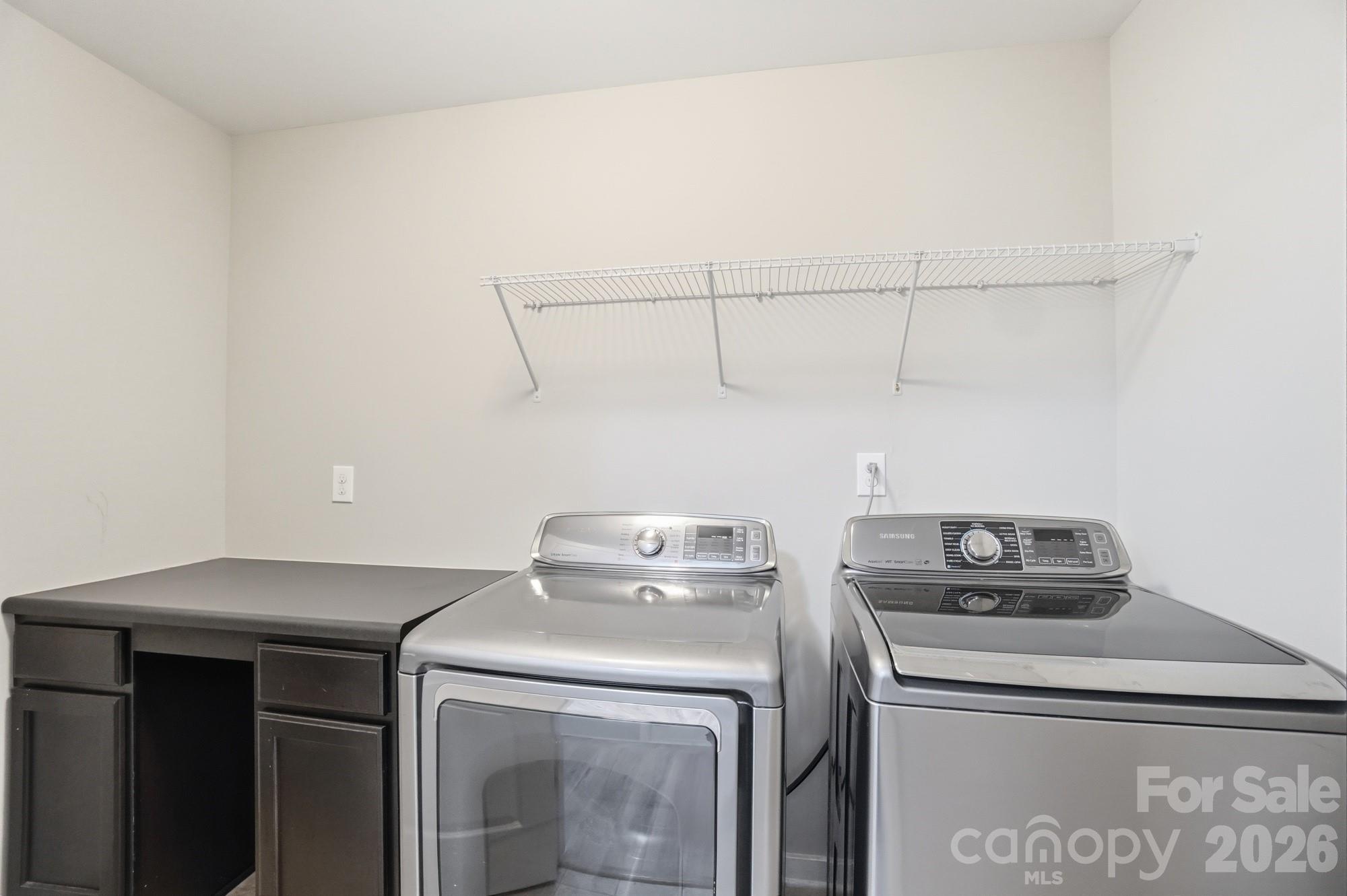 2153 Bluebell Way Tega Cay, SC 29708 - Photo 41 of 48 a utility room with dryer and washer