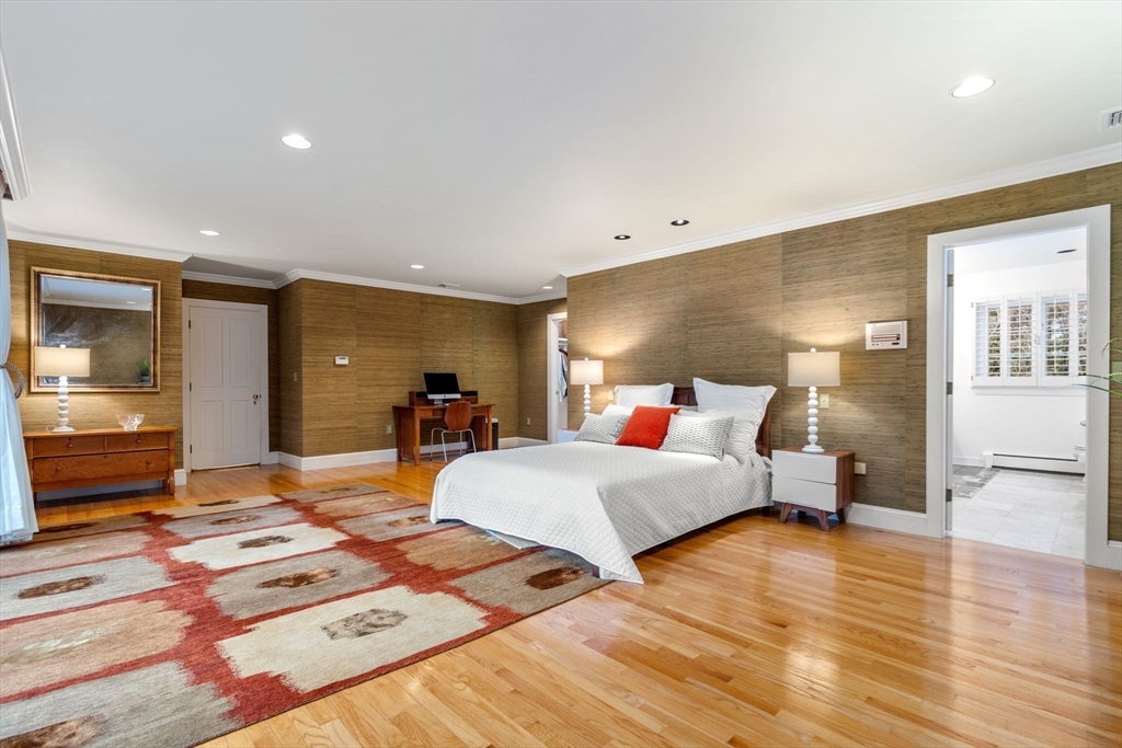 26 Bullard Road Weston, MA 02493 - Photo 18 of 31 a bed room with a bed and wooden floor