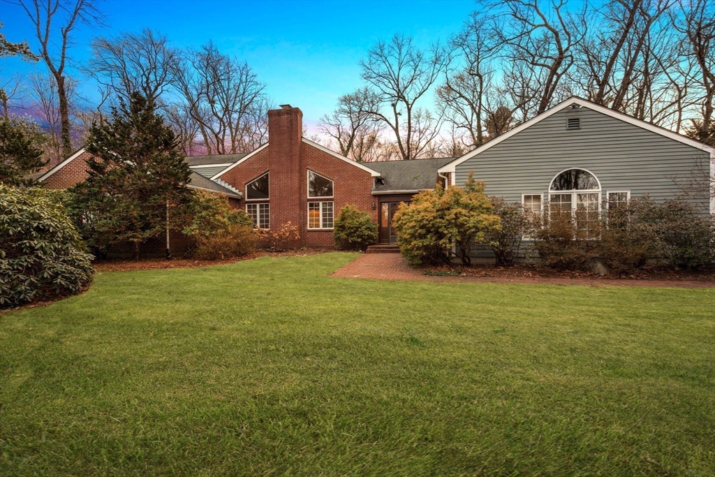 26 Bullard Road Weston, MA 02493 - Photo 2 of 31 a front view of house with yard and green space