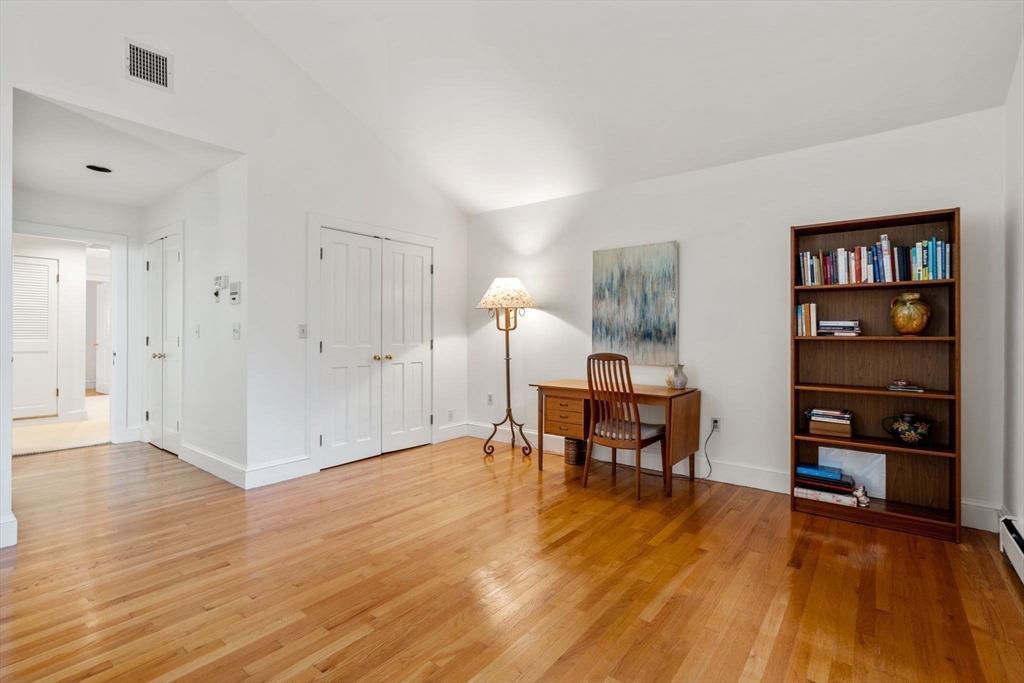 26 Bullard Road Weston, MA 02493 - Photo 24 of 31 a view of a livingroom with furniture and wooden floor
