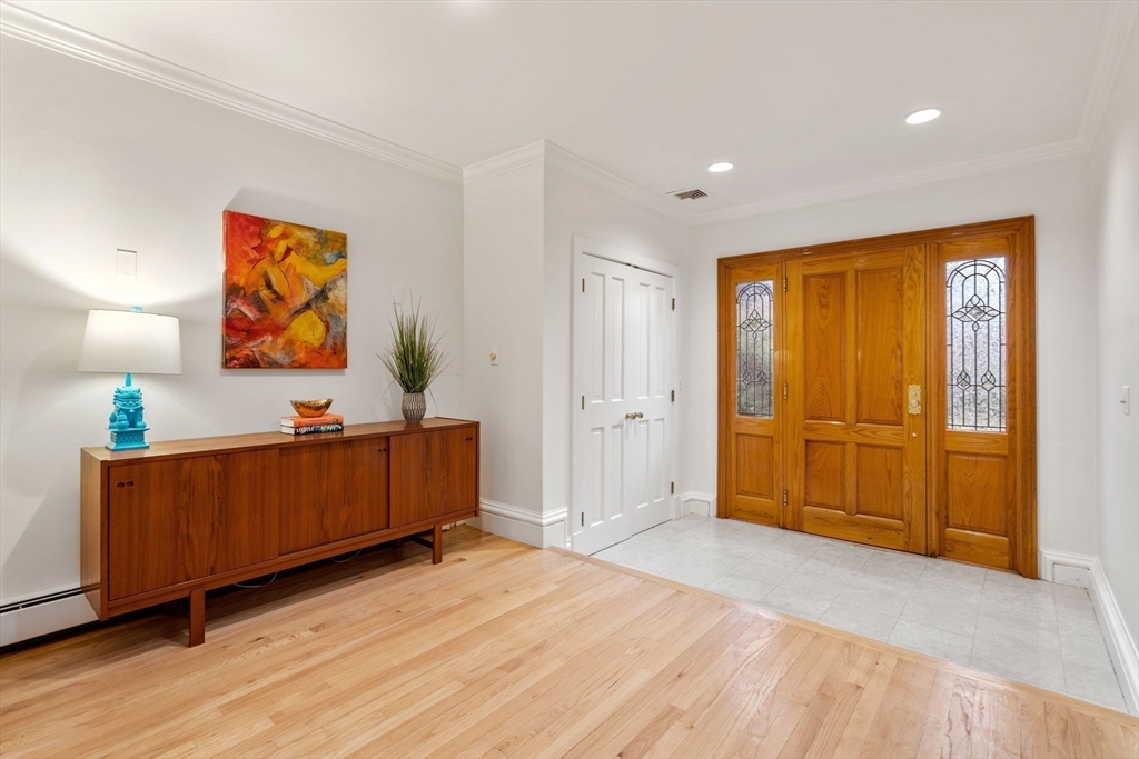 26 Bullard Road Weston, MA 02493 - Photo 4 of 31 a view of a room with wooden floor and cabinet