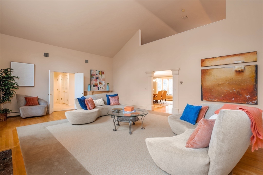 26 Bullard Road Weston, MA 02493 - Photo 7 of 31 a living room with furniture and a flat screen tv