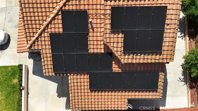 a view of swimming pool with a garden and seating area