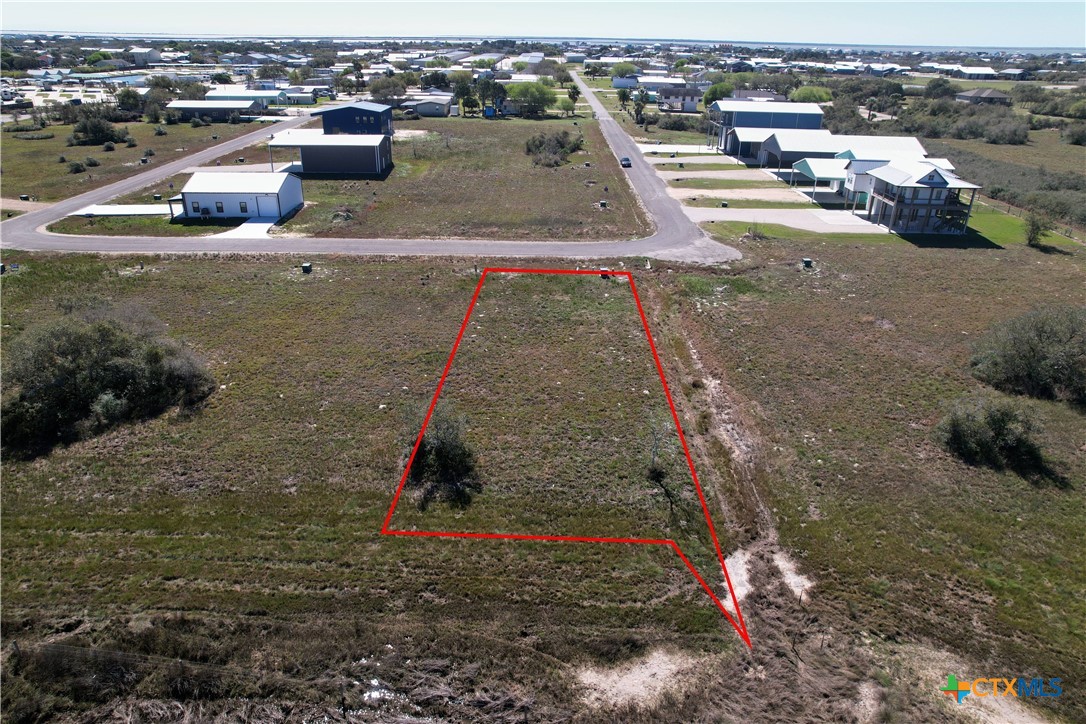 12 Easy Street Port O'Connor, TX 77982 - Photo 16 of 31 an aerial view of a house with a yard