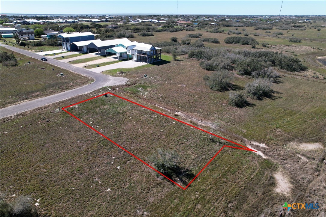 12 Easy Street Port O'Connor, TX 77982 - Photo 17 of 31 an aerial view of a house with a yard and lake view