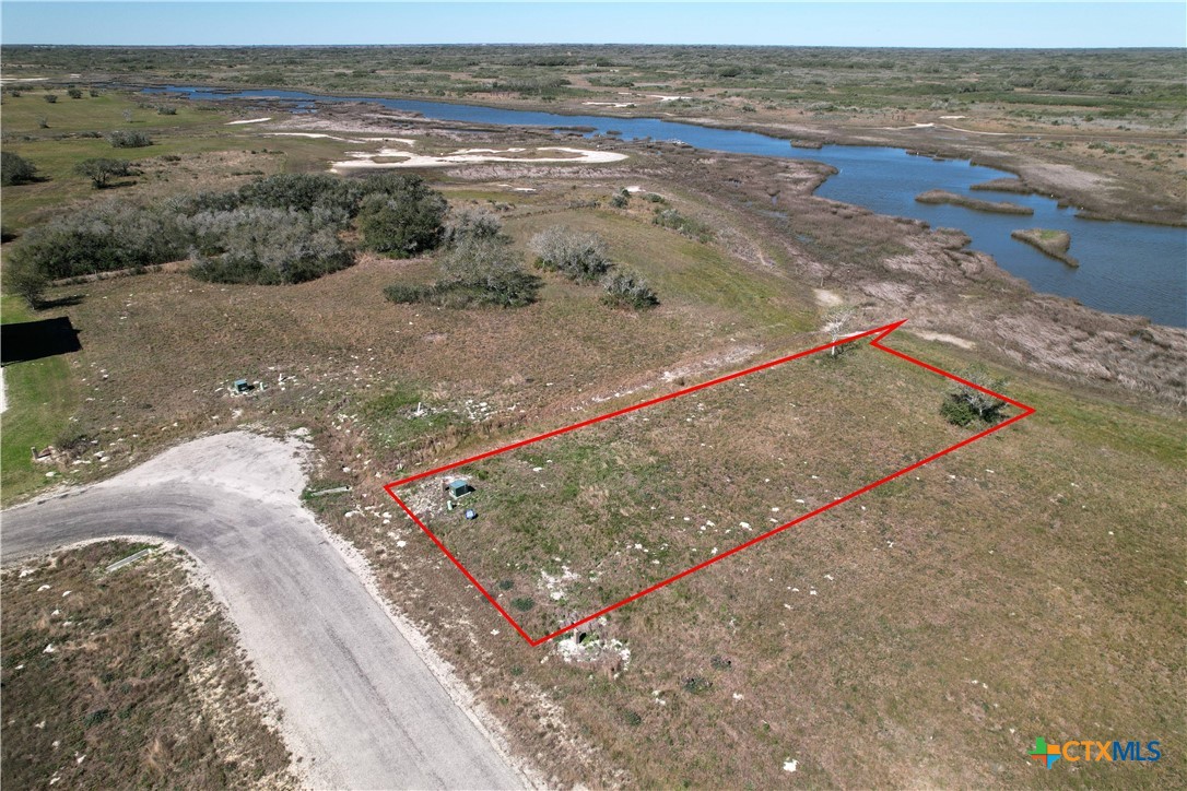 12 Easy Street Port O'Connor, TX 77982 - Photo 8 of 31 a view of a lake with beach and ocean