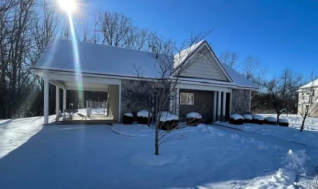 $325,000 | 631 Pebblestone Lane, Chelsea, MI 48118