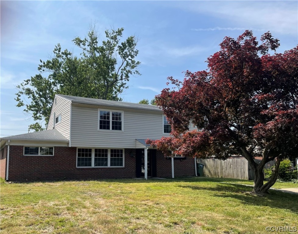 1302 Andover Road Henrico, VA 23229 - Photo 1 of 15 a view of a house with a yard