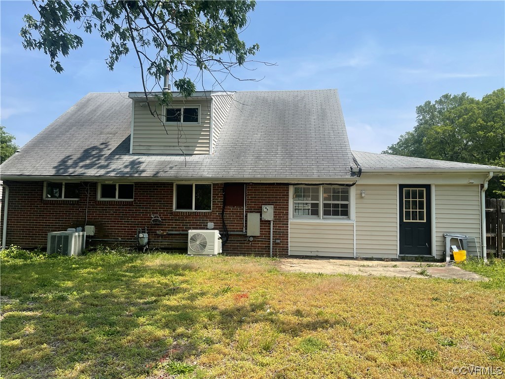 1302 Andover Road Henrico, VA 23229 - Photo 14 of 15 a front view of a house with a yard