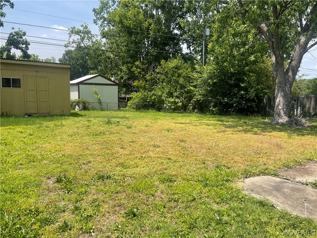 1302 Andover Road Henrico, VA 23229 - Photo 15 of 15 a view of a yard with a house in the background
