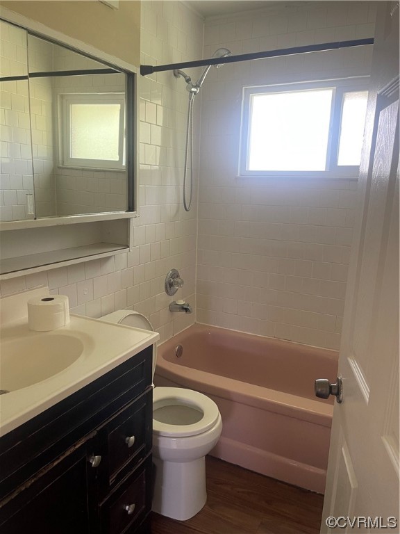 1302 Andover Road Henrico, VA 23229 - Photo 9 of 15 a bathroom with a sink a toilet and shower