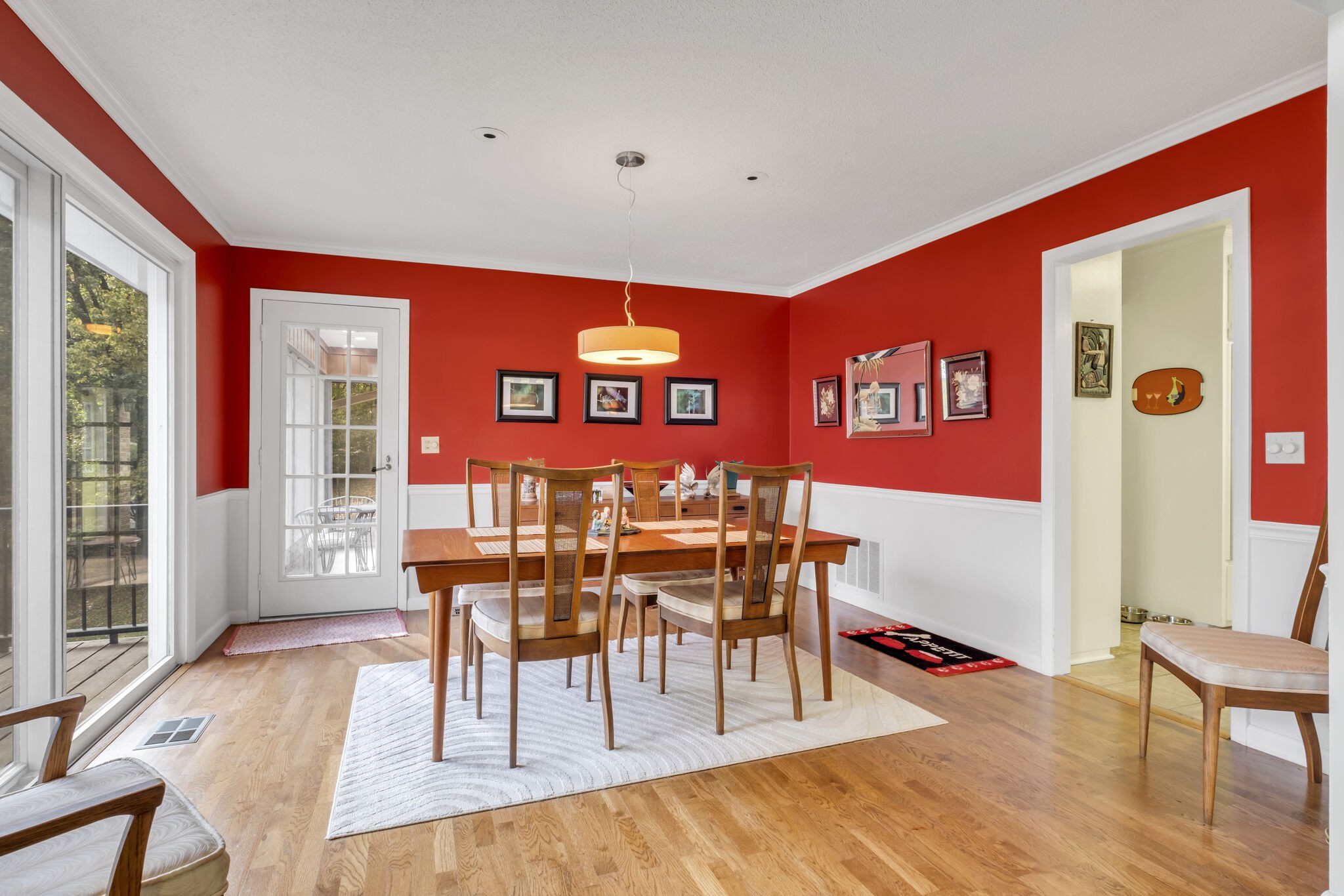 1524 Cherokee Road Gallatin, TN 37066 - Photo 23 of 65 a view of a dining area with furniture and wooden floor