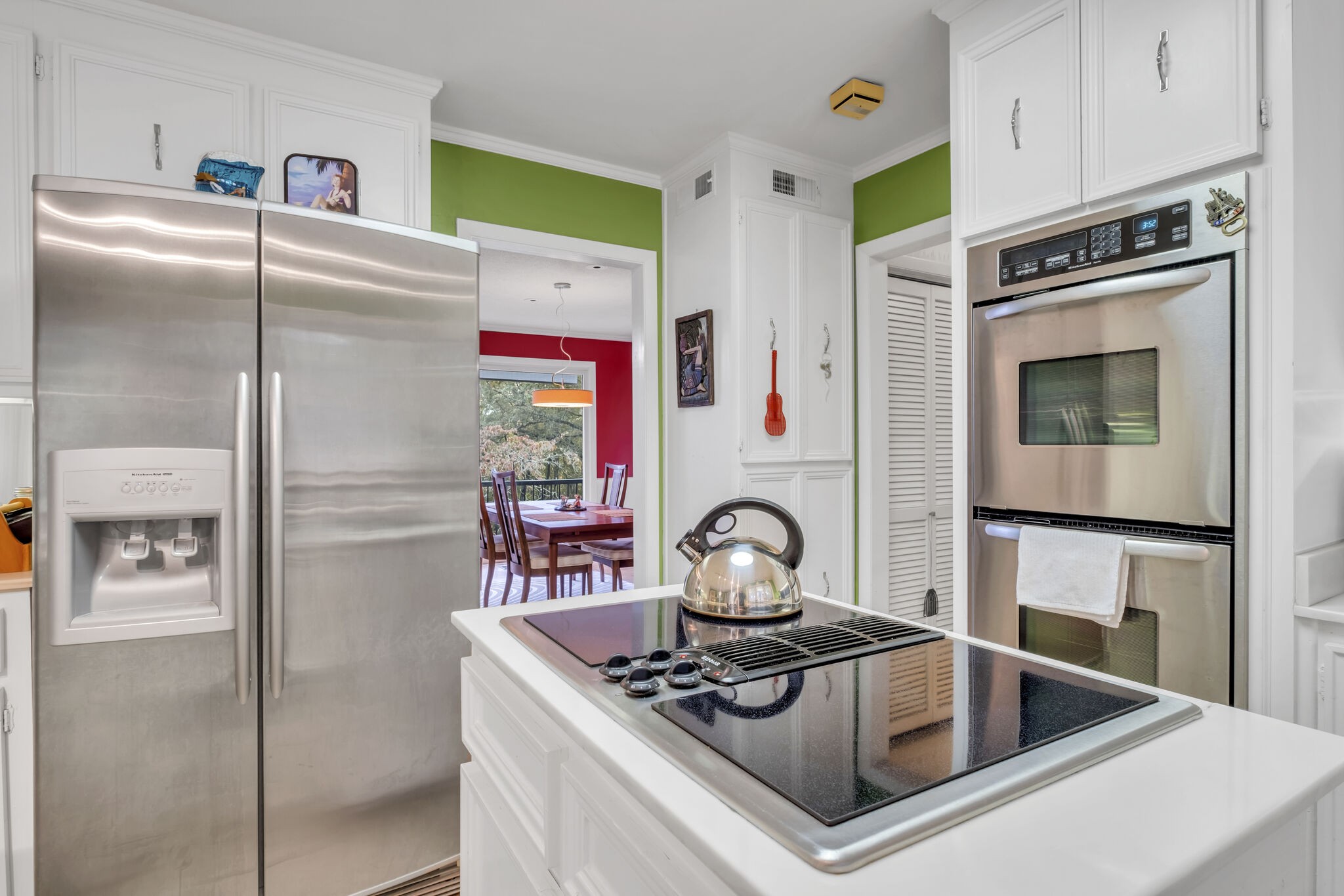 1524 Cherokee Road Gallatin, TN 37066 - Photo 29 of 65 a kitchen with refrigerator a stove a sink and a cabinets