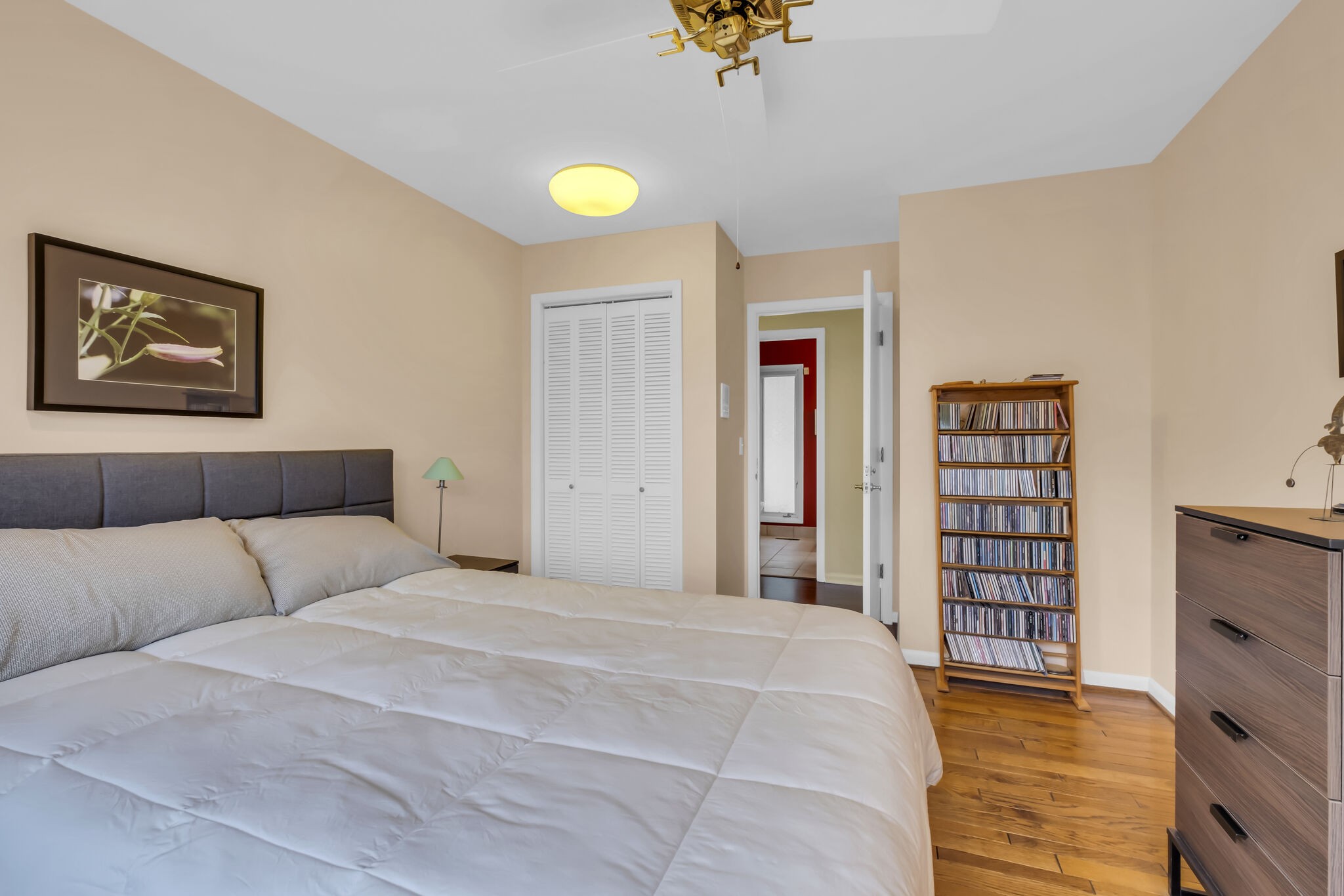 1524 Cherokee Road Gallatin, TN 37066 - Photo 33 of 65 a bedroom with a bed and a potted plant