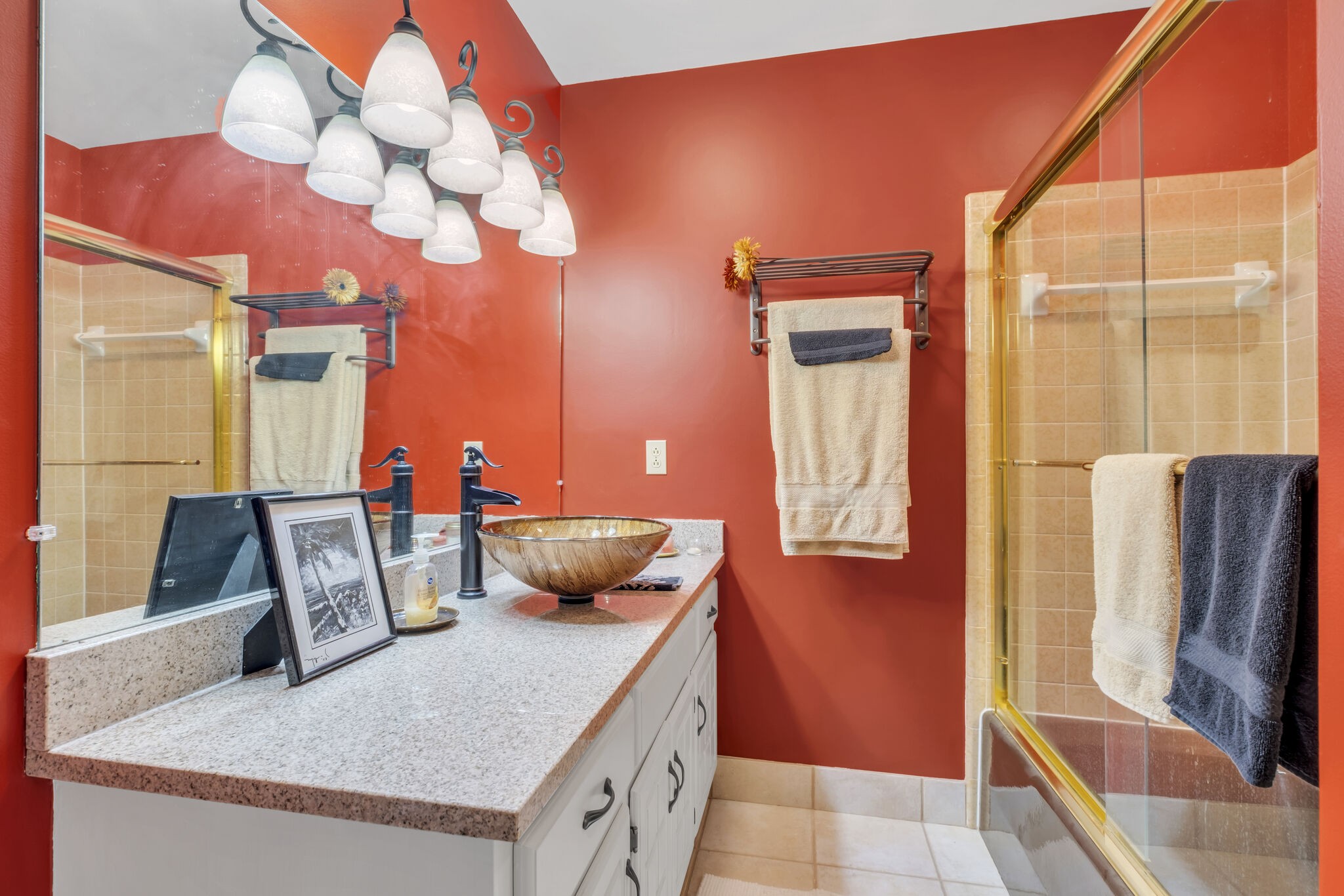 1524 Cherokee Road Gallatin, TN 37066 - Photo 34 of 65 a bathroom with a sink a mirror and a shower