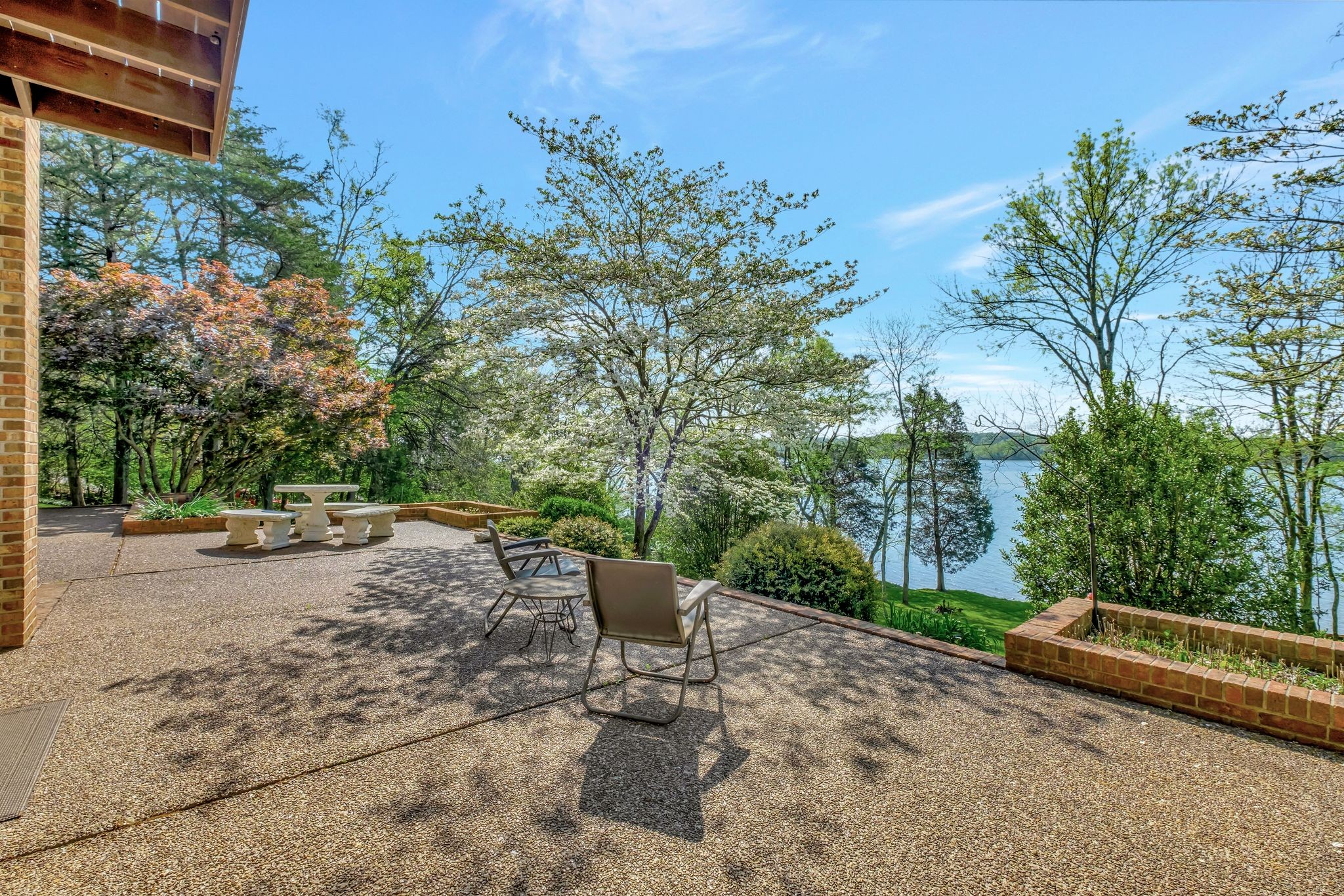 1524 Cherokee Road Gallatin, TN 37066 - Photo 52 of 65 a view of a backyard with a bench and some plants