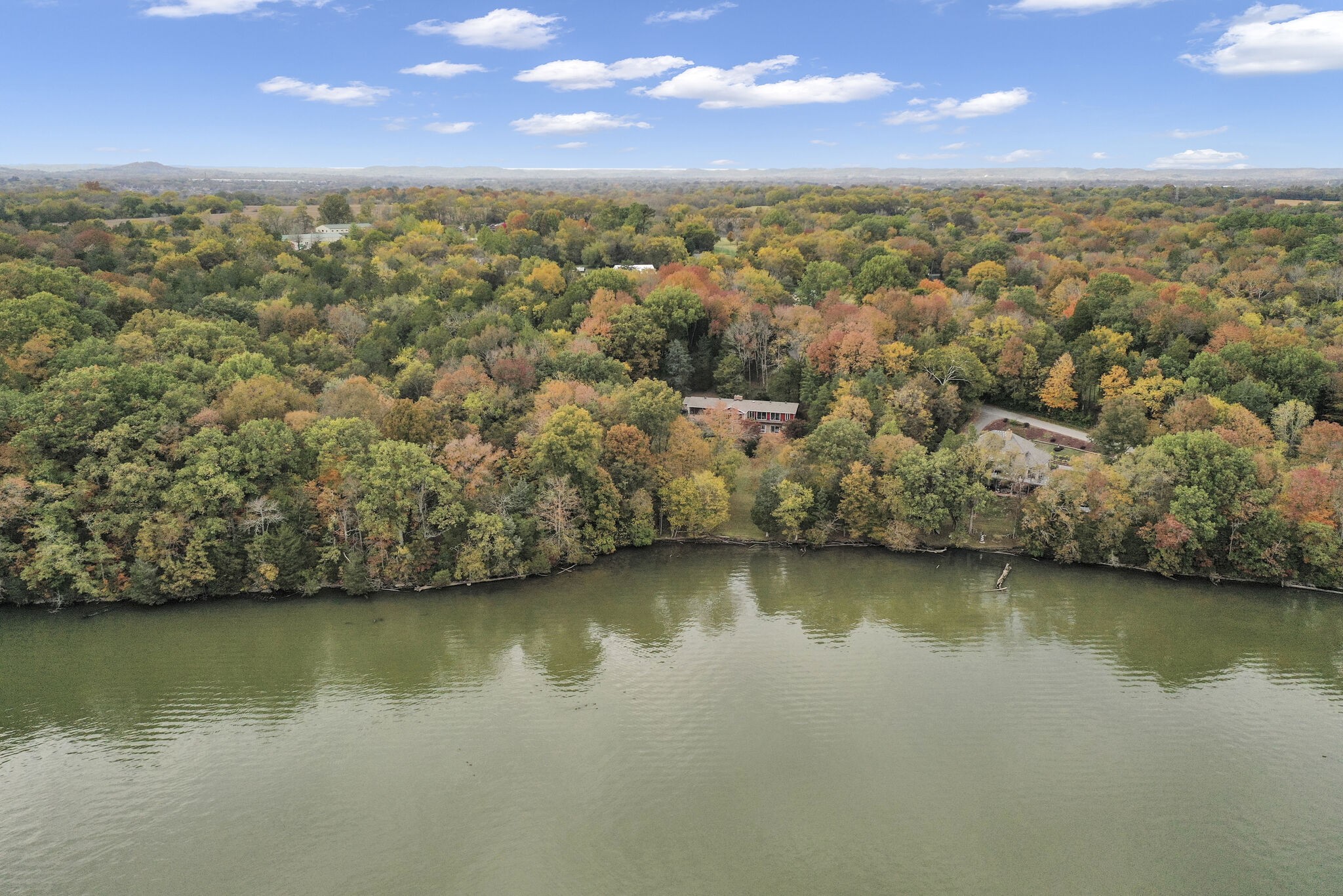 1524 Cherokee Road Gallatin, TN 37066 - Photo 61 of 65 an aerial view of residential houses with lake view