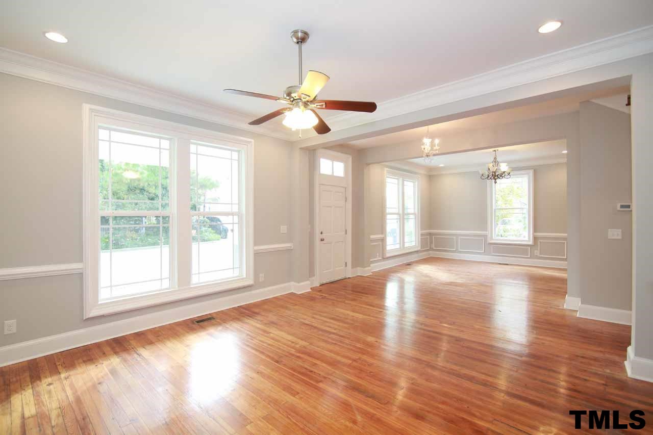 310 South State Street Raleigh, NC 27601 - Photo 22 of 25 a view of an empty room with window and wooden floor