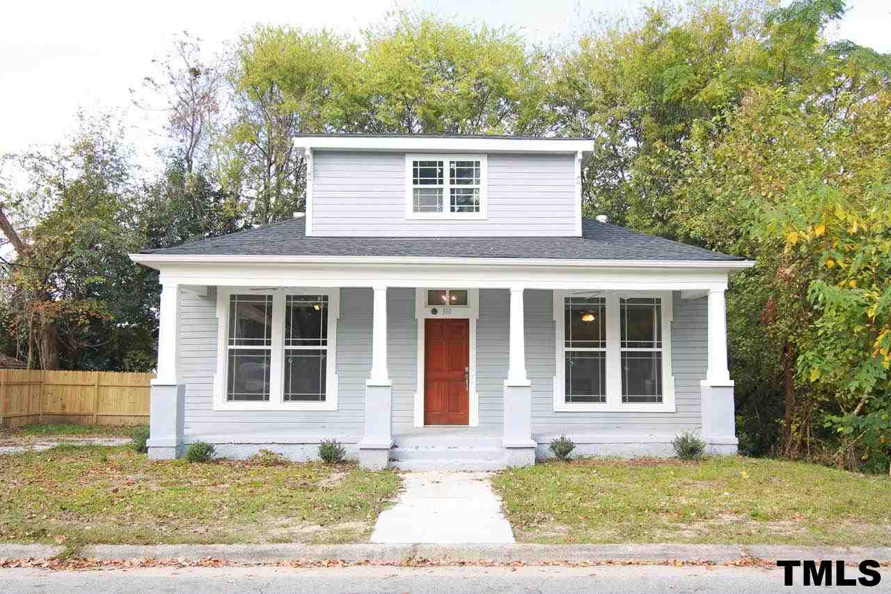 310 South State Street Raleigh, NC 27601 - Photo 23 of 25 a house with trees in the background