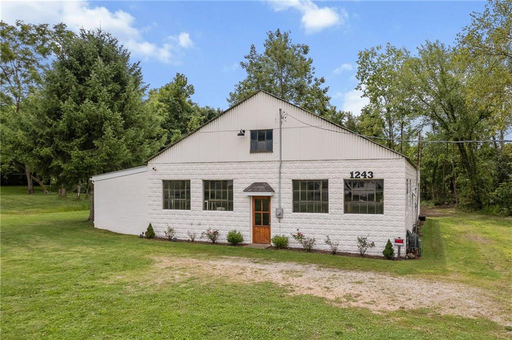 1243 Mayview Road Pittsburgh, PA 15241 - Photo 1 of 13 a view of a house with a yard